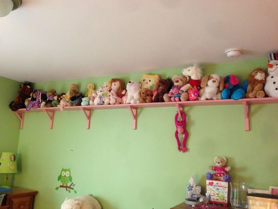 stuffed animals on wall